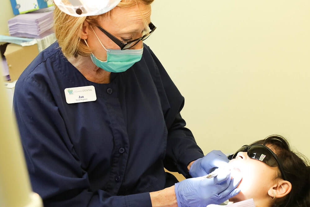 Deep cleaning Denver Dentist Dental Implants 303 756 3289